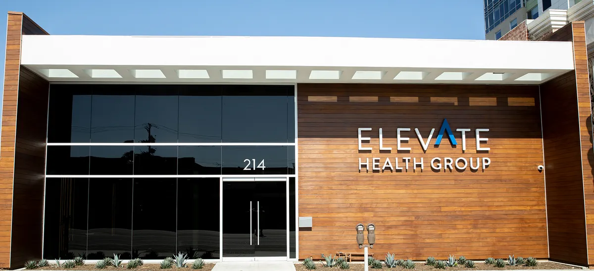 Elevate Health Group medical practice in Southern California with a modern healthcare facility exterior.