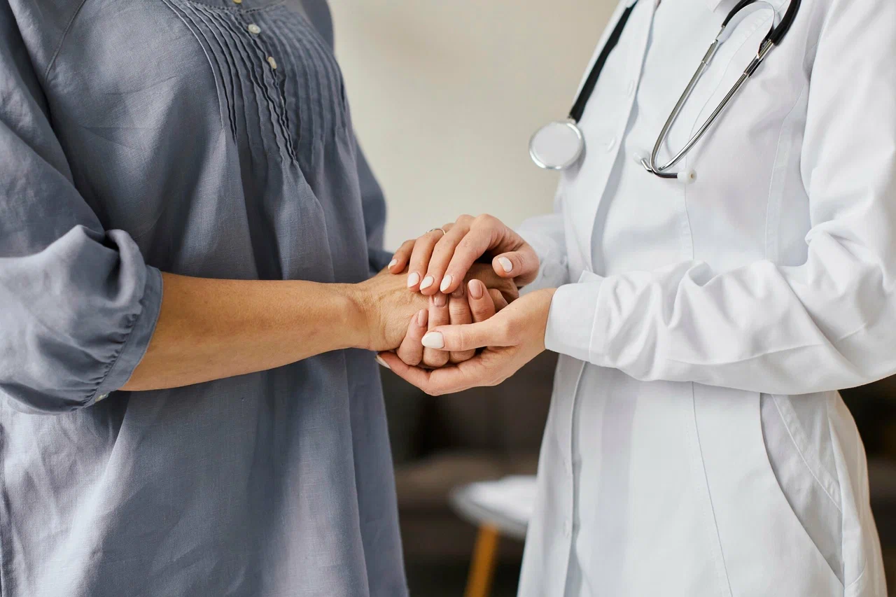 Doctor consulting with a patient in a medical